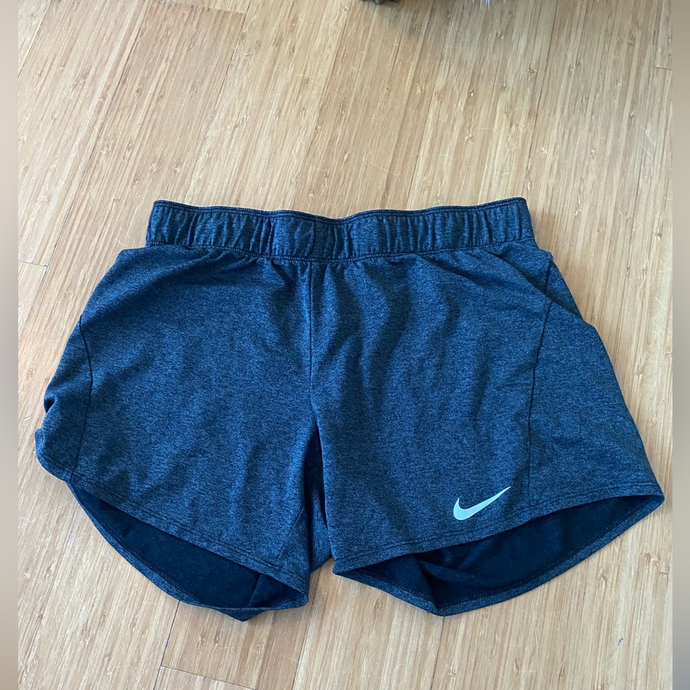 Women’s Nike, grey shorts, drawstring waist tie, Size small. Great condition